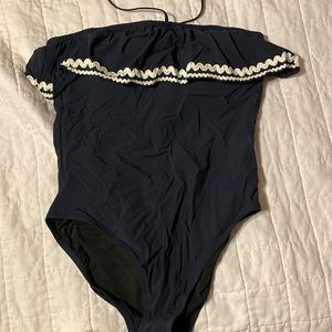 JCREW navy one piece swimsuit. ruffle around top. worn strapless, halter.